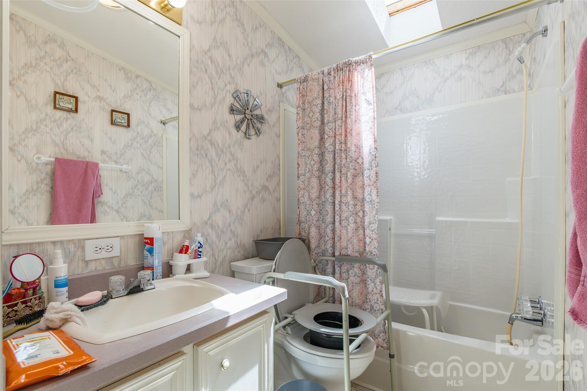 777 John Doster Road Pageland, SC 29728 - Photo 26 of 34 a bathroom with a sink and a tub