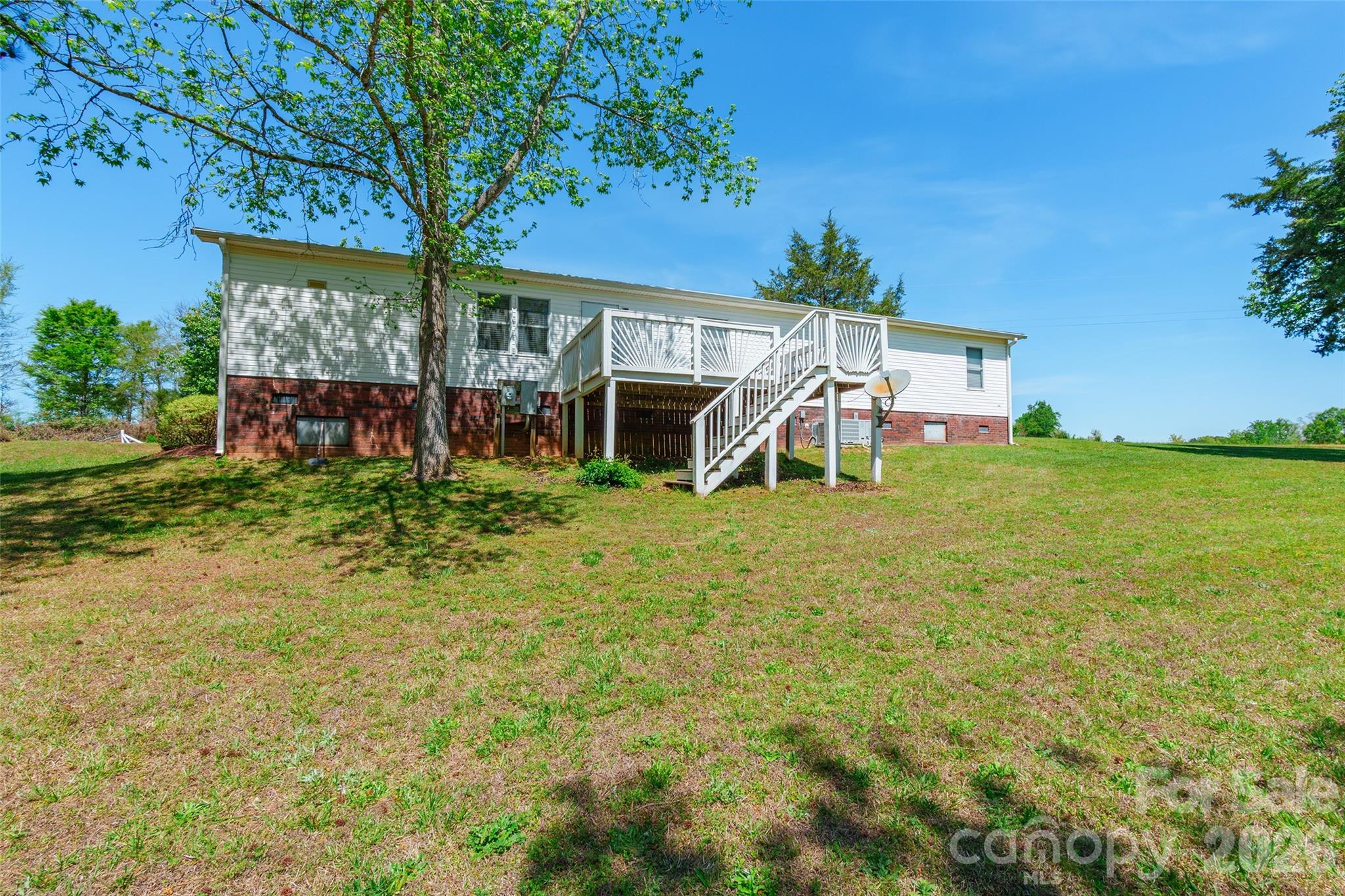 777 John Doster Road Pageland, SC 29728 - Photo 30 of 34 a view of a house with pool and garden