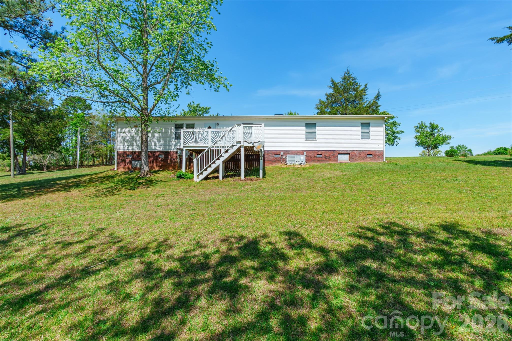 777 John Doster Road Pageland, SC 29728 - Photo 32 of 34 a view of a house with a yard