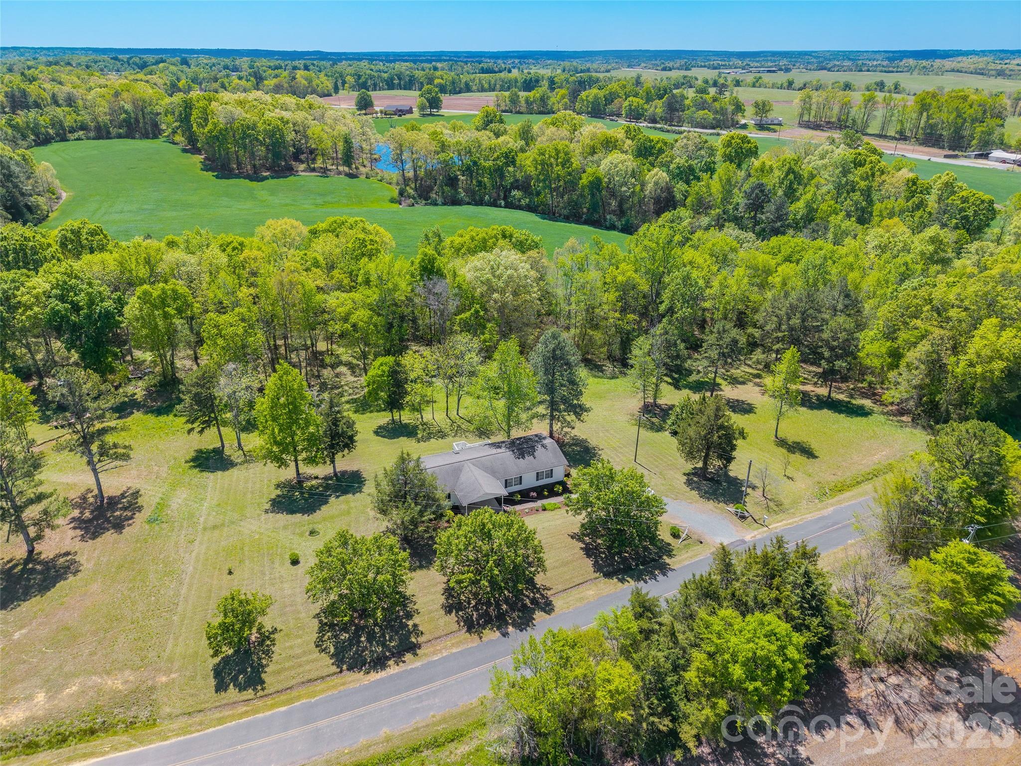 777 John Doster Road Pageland, SC 29728 - Photo 33 of 34 a view of a garden with a lake