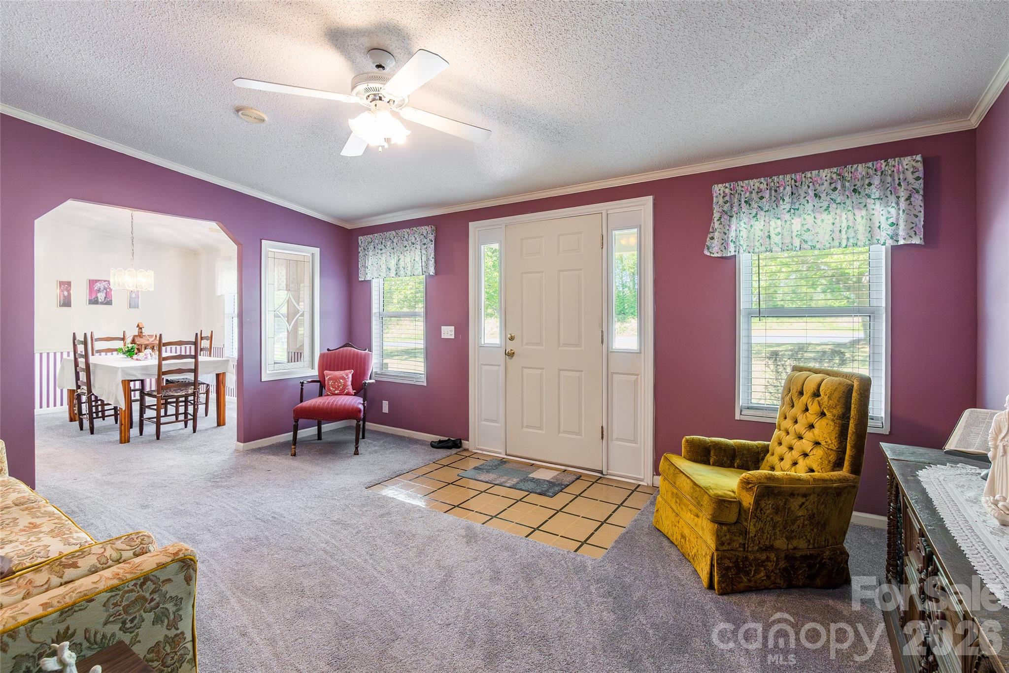 777 John Doster Road Pageland, SC 29728 - Photo 6 of 34 a living room with furniture and a large window