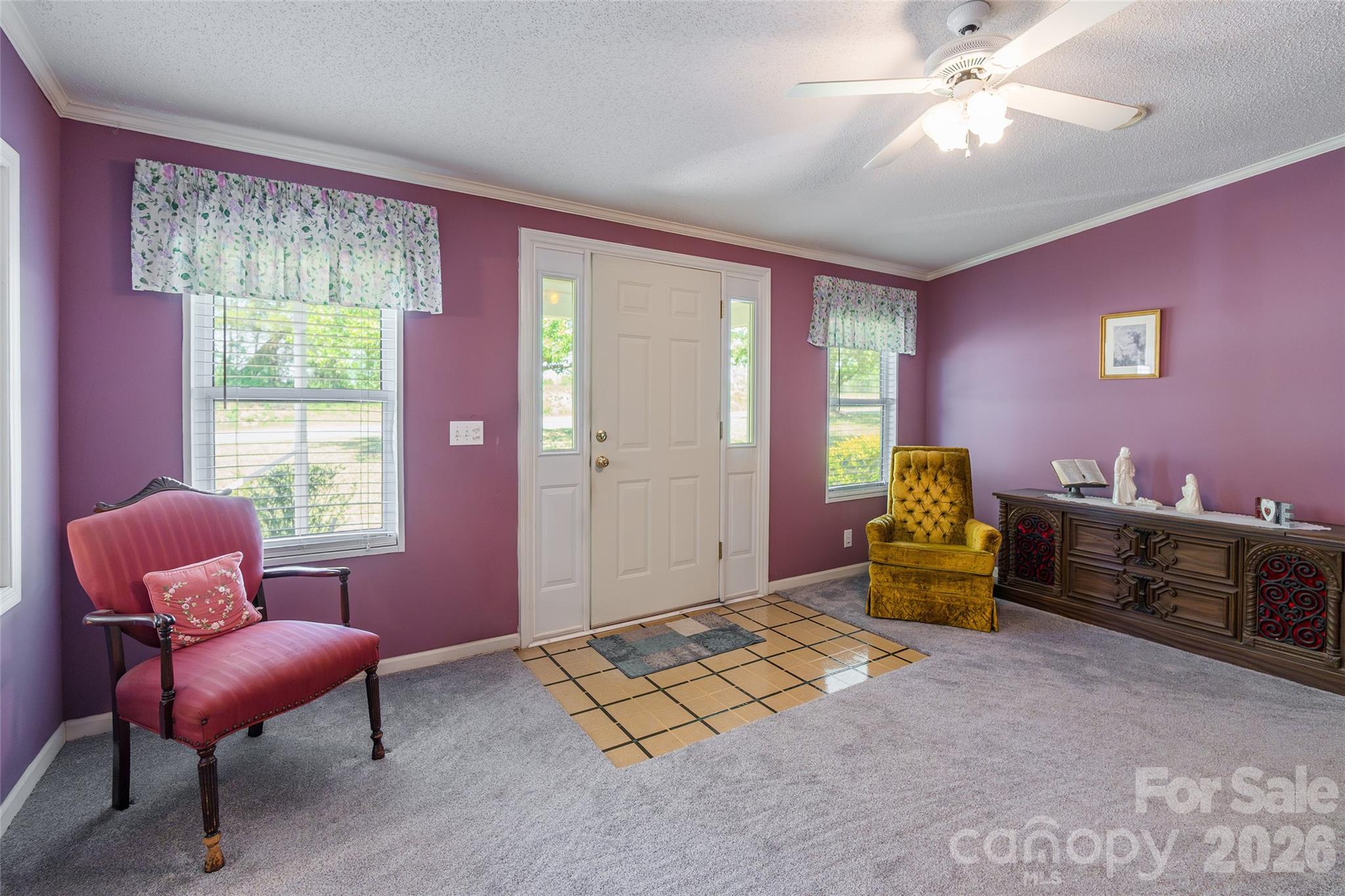 777 John Doster Road Pageland, SC 29728 - Photo 7 of 34 a bedroom with furniture and a window