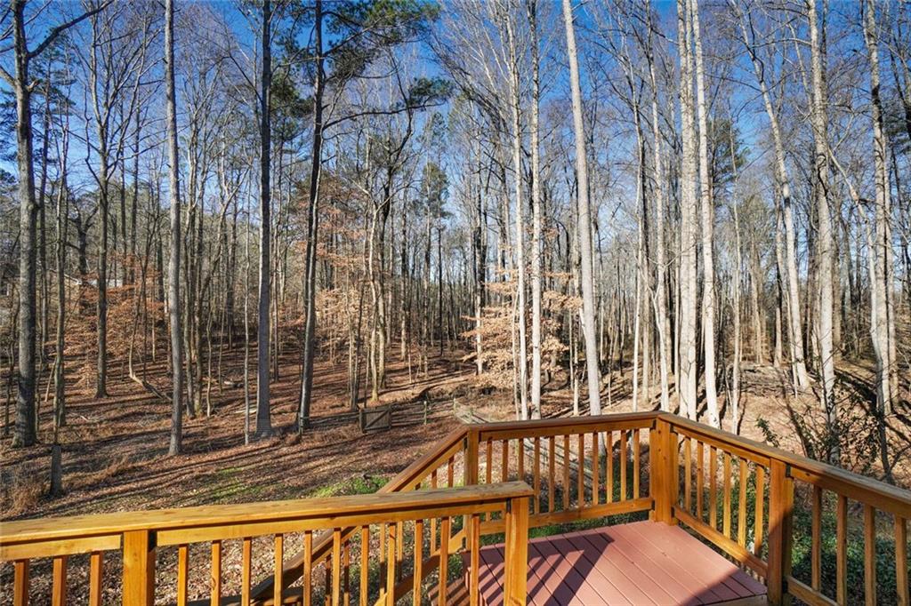 5295 Ridge Road Douglasville, GA 30134 - Photo 29 of 36 a view of a balcony with wooden floor and fence