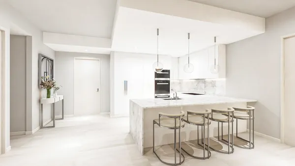 a kitchen with stainless steel appliances a table and chairs in it