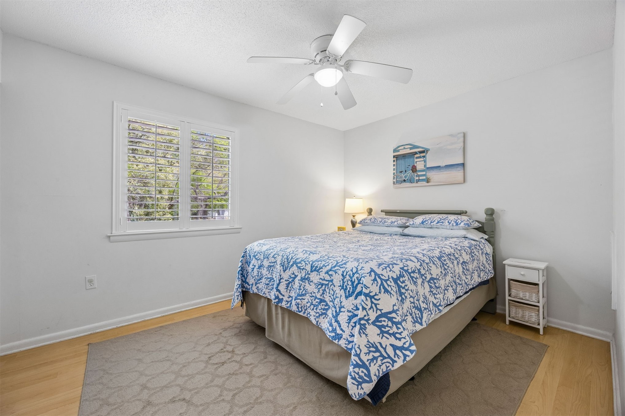 2328 Sadler Road, Unit 1C Fernandina Beach, FL 32034 - Photo 22 of 49 a bedroom with a bed and a window