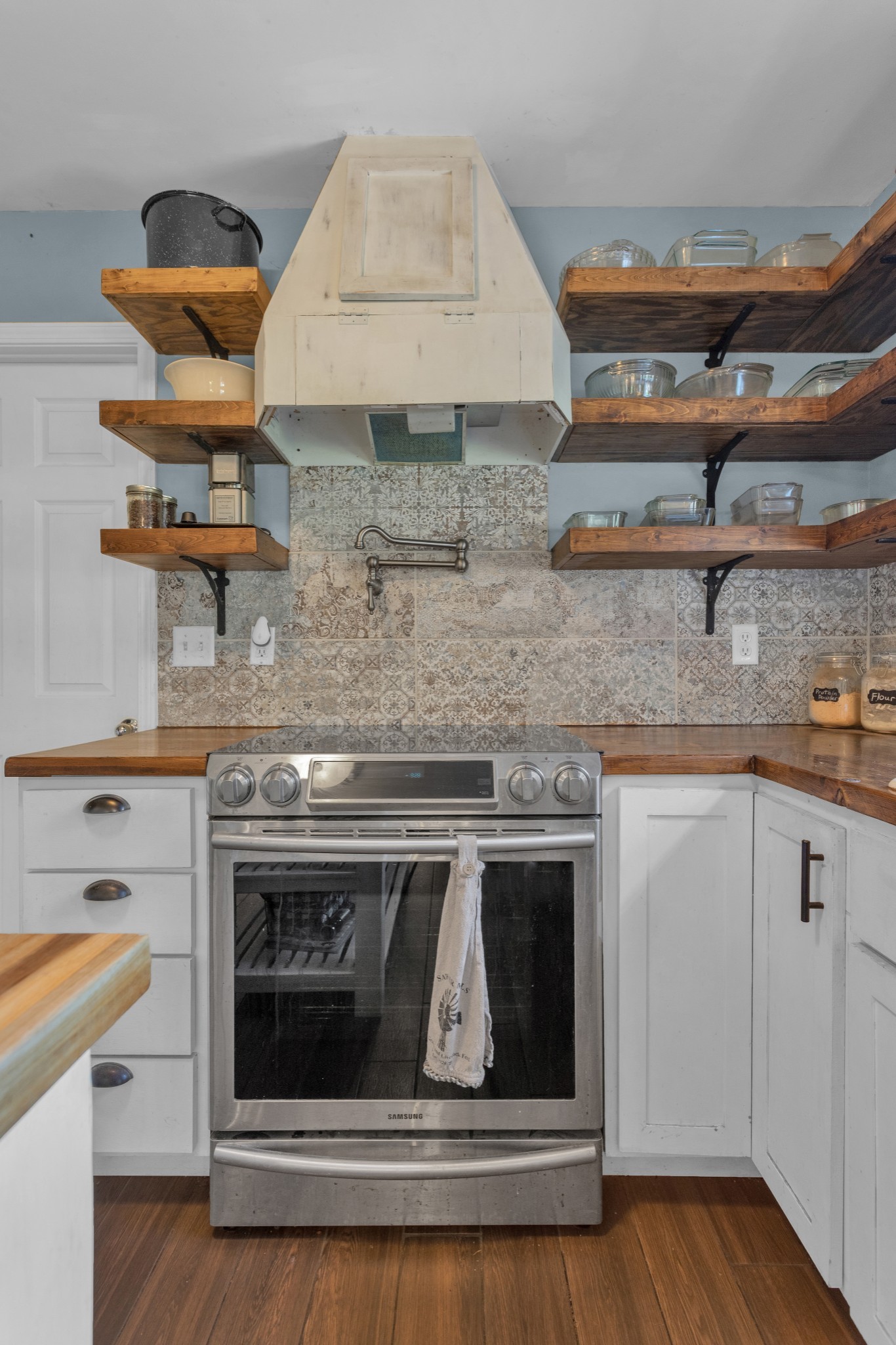 2105 Burgess Lane Spring Hill, TN 37174 - Photo 11 of 36 a stove top oven sitting inside of a kitchen