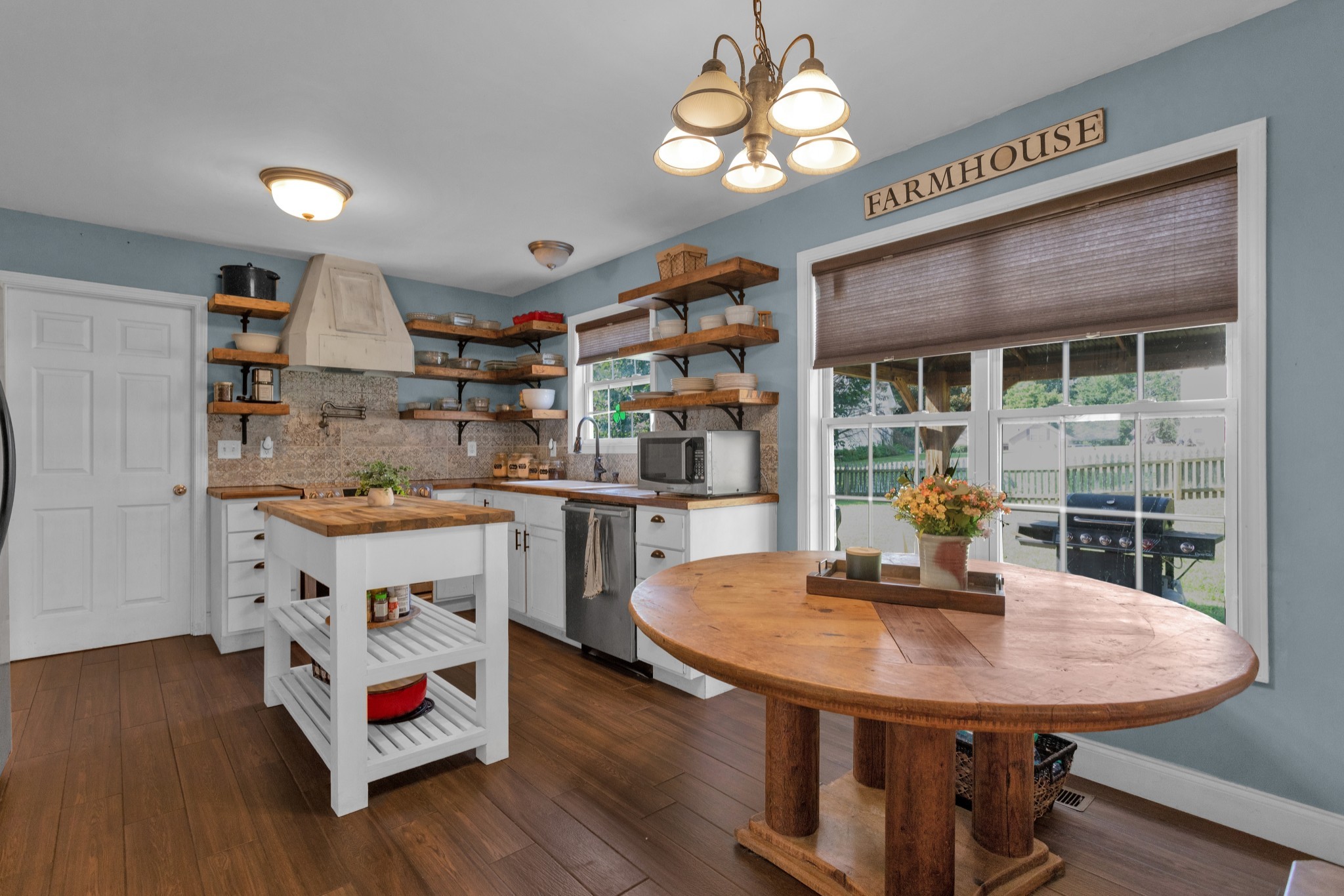 2105 Burgess Lane Spring Hill, TN 37174 - Photo 12 of 36 a view of a dining room with furniture and wooden floor