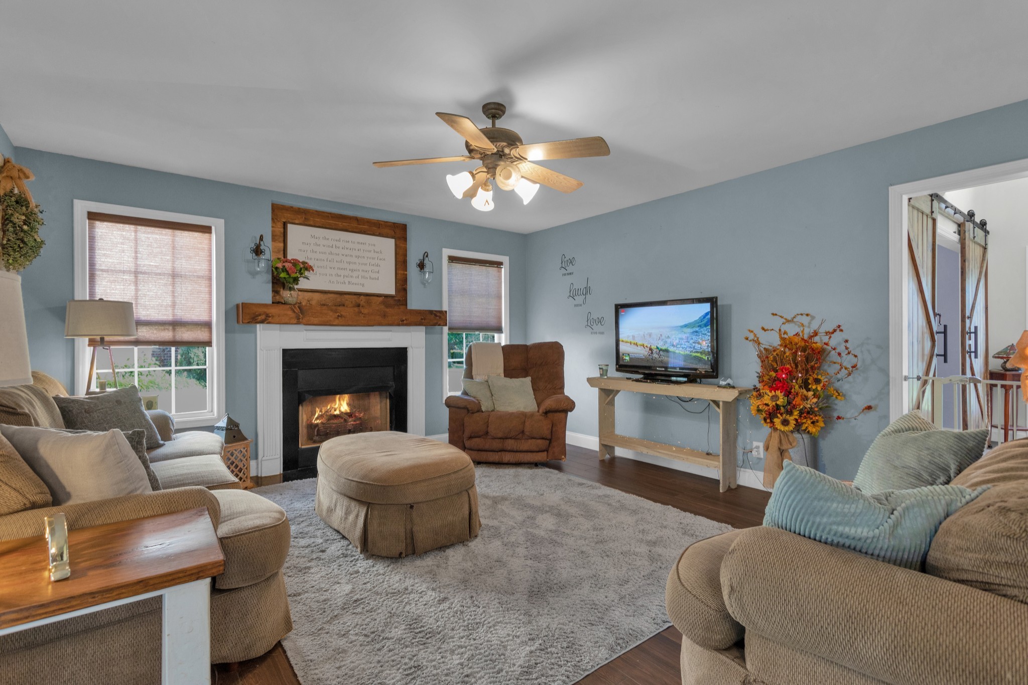 2105 Burgess Lane Spring Hill, TN 37174 - Photo 13 of 36 a living room with furniture and a fireplace