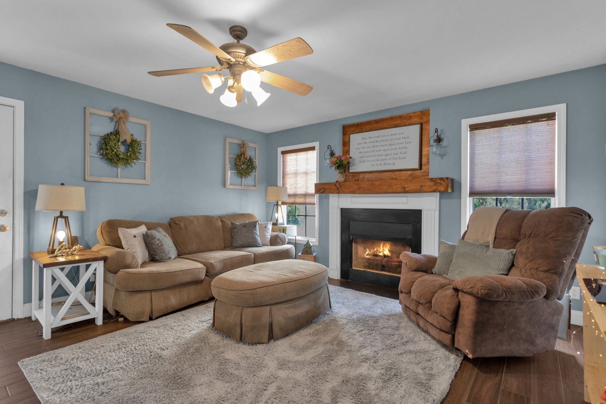 2105 Burgess Lane Spring Hill, TN 37174 - Photo 15 of 36 a living room with furniture and a fireplace
