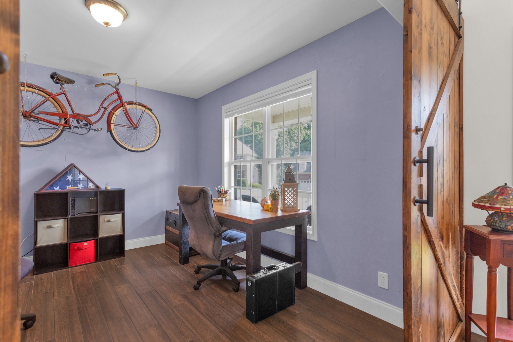 2105 Burgess Lane Spring Hill, TN 37174 - Photo 16 of 36 a view of a room with wooden floor and windows