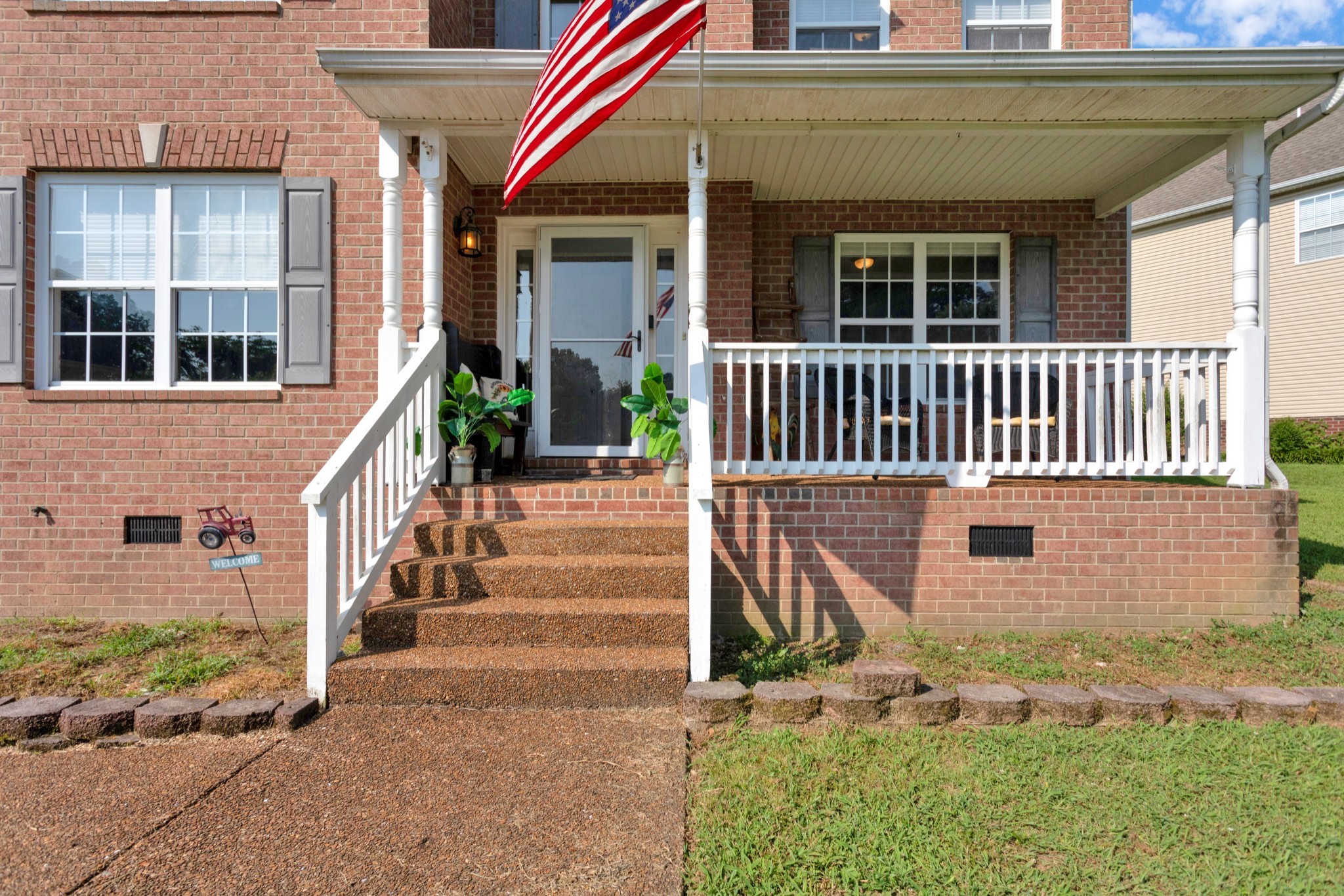 2105 Burgess Lane Spring Hill, TN 37174 - Photo 2 of 36 front view of a house with a yard