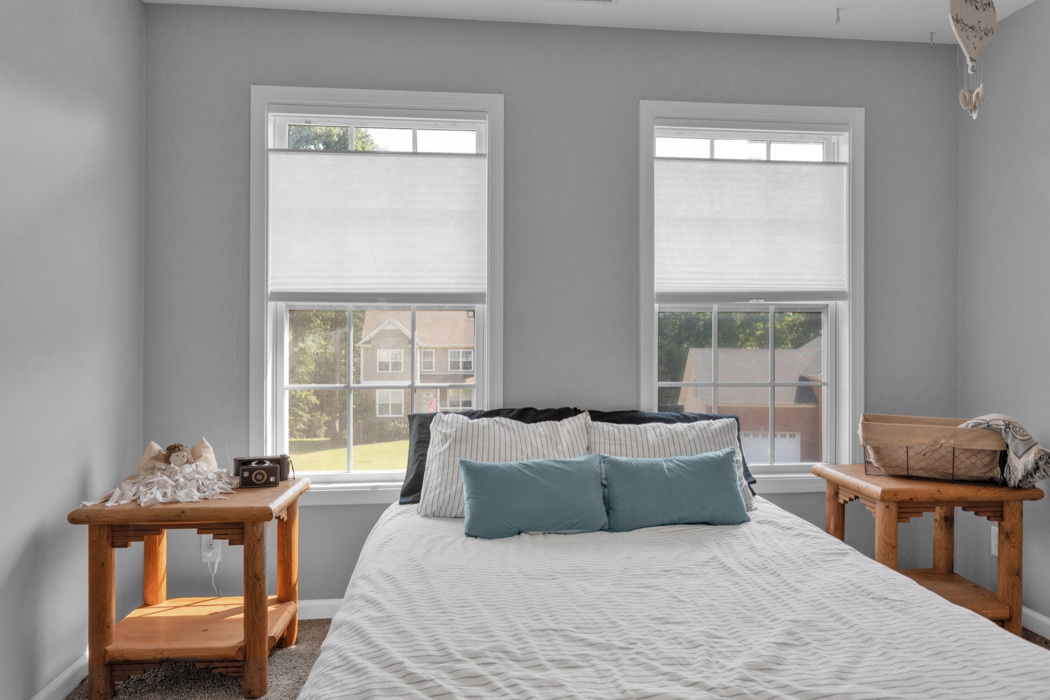 2105 Burgess Lane Spring Hill, TN 37174 - Photo 25 of 36 a bedroom with a bed and a window