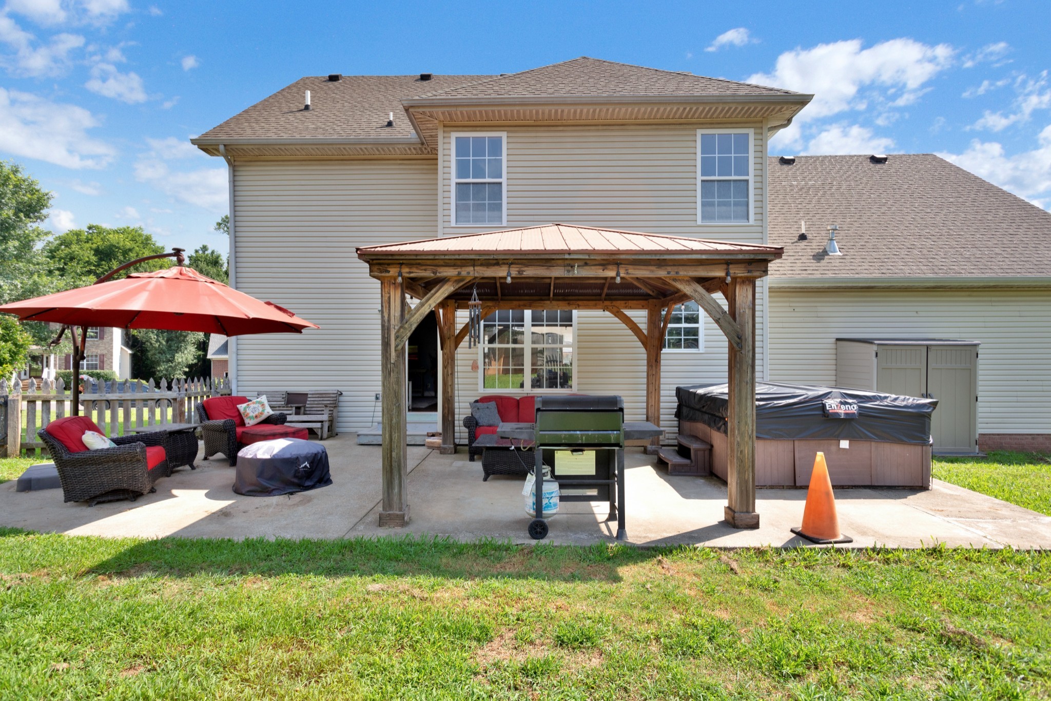 2105 Burgess Lane Spring Hill, TN 37174 - Photo 32 of 36 a view of an house with backyard porch and furniture