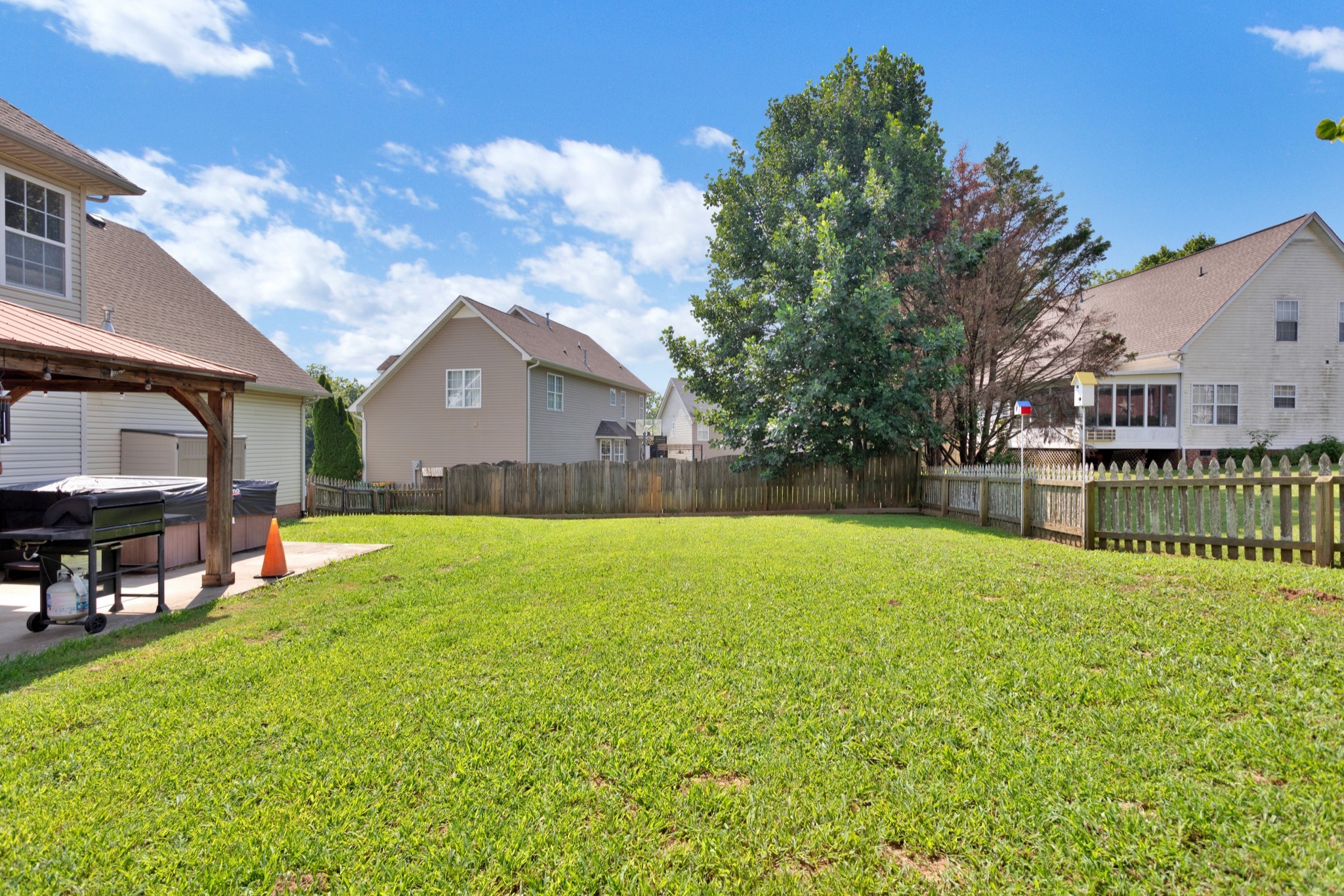 2105 Burgess Lane Spring Hill, TN 37174 - Photo 35 of 36 a front view of house with yard and seating area