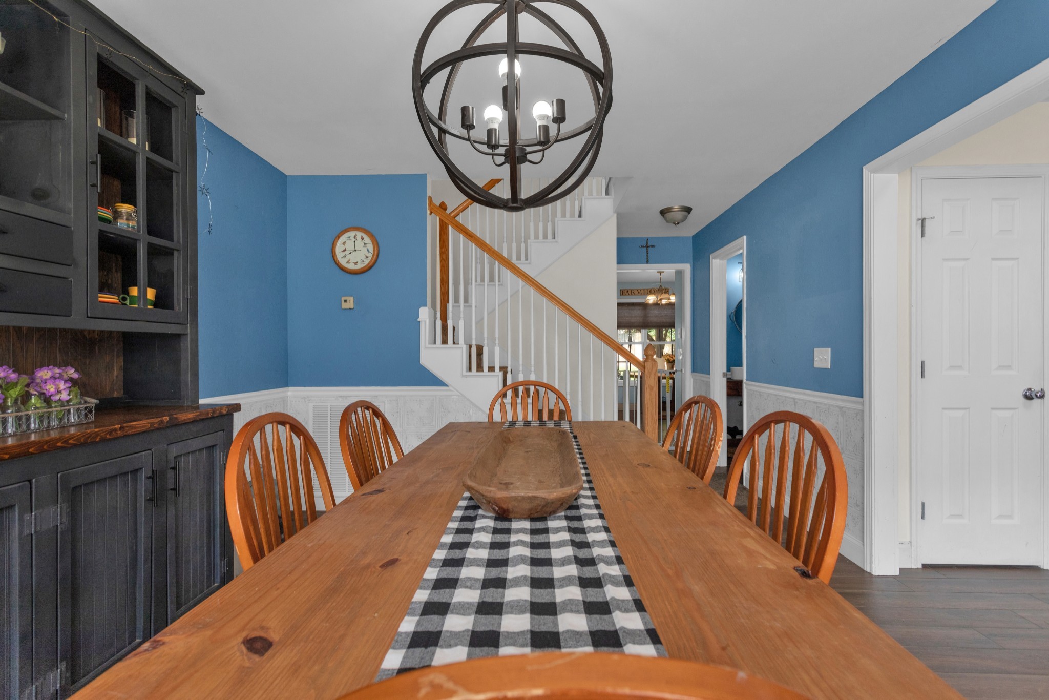 2105 Burgess Lane Spring Hill, TN 37174 - Photo 7 of 36 a view of a hallway with wooden floor and windows