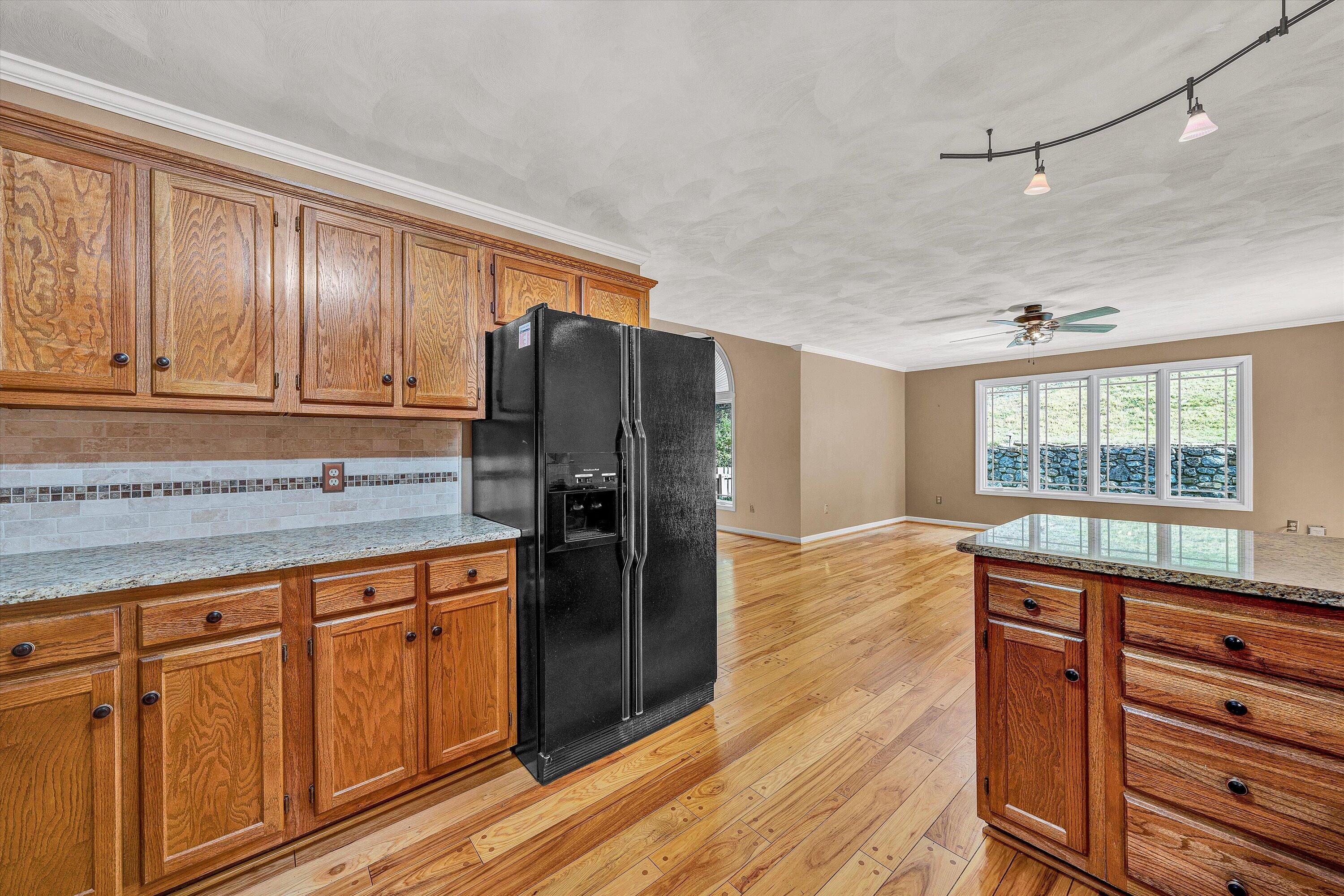 29 Serenity Lane Blue Ridge, VA 24064 - Photo 14 of 81 a kitchen with stainless steel appliances granite countertop a refrigerator and a sink