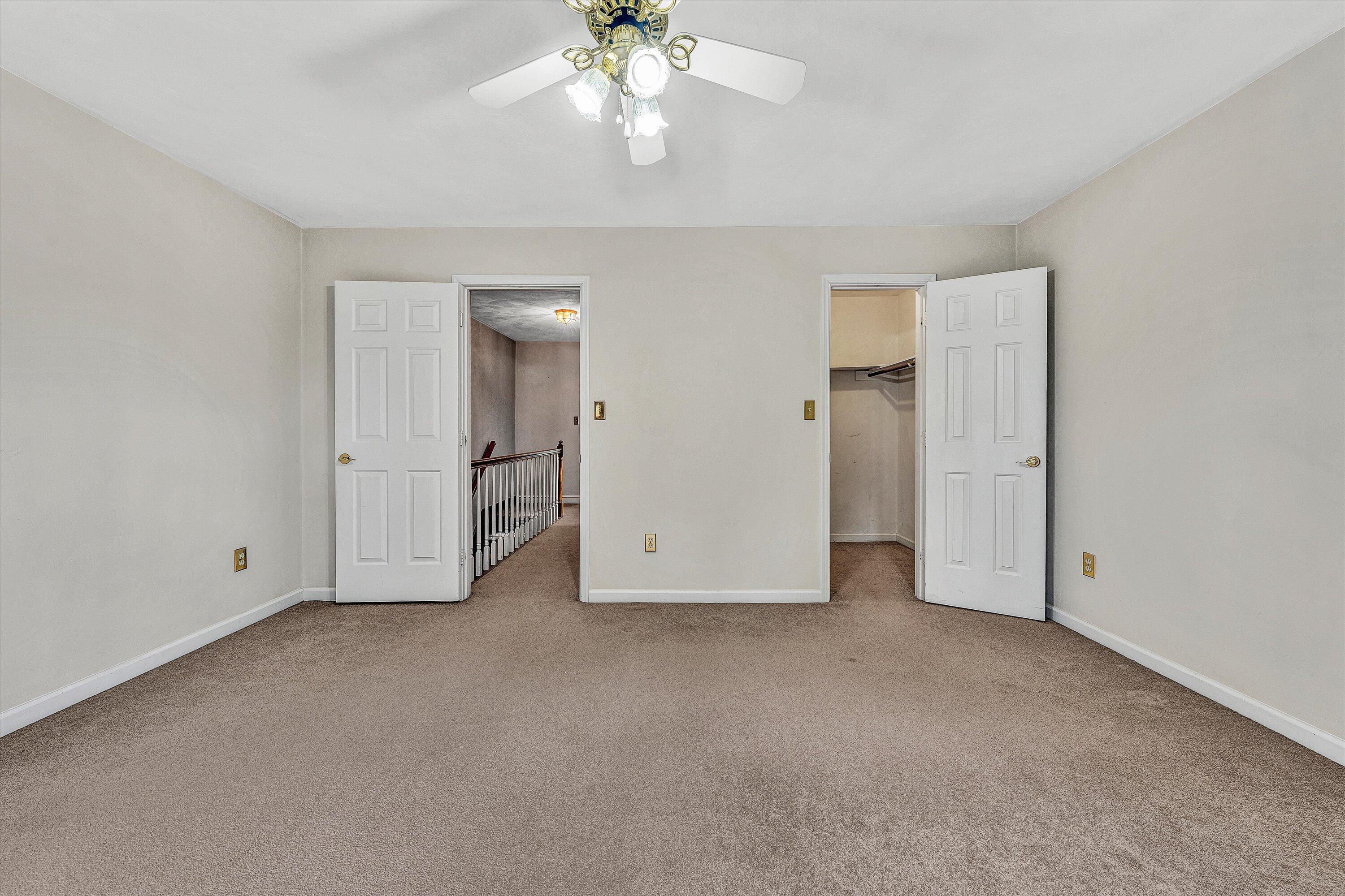 29 Serenity Lane Blue Ridge, VA 24064 - Photo 33 of 81 an empty room with chandelier fan