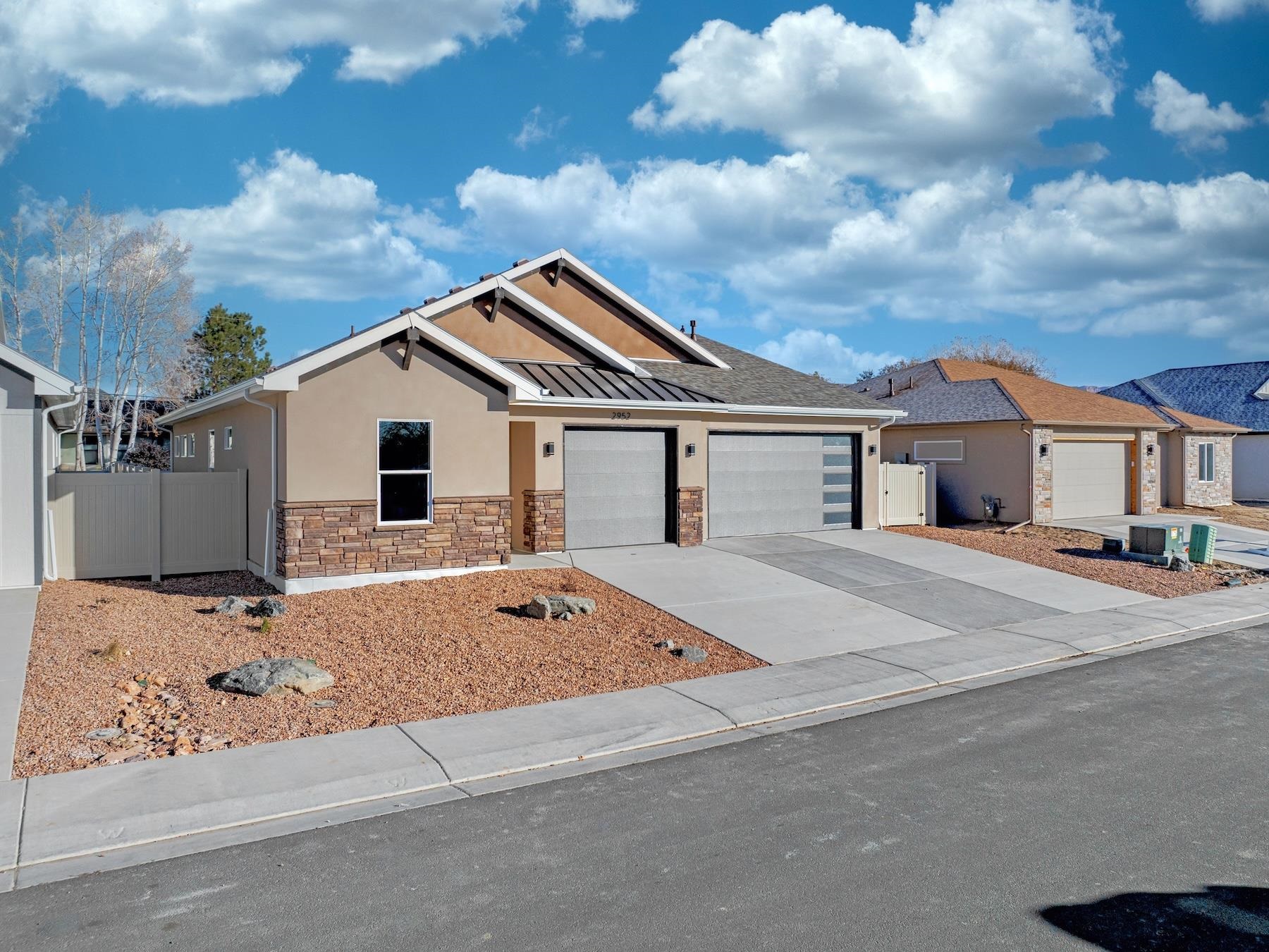 2952 Apollo Drive Grand Junction, CO 81504 - Photo 3 of 27 a front view of a house with a space