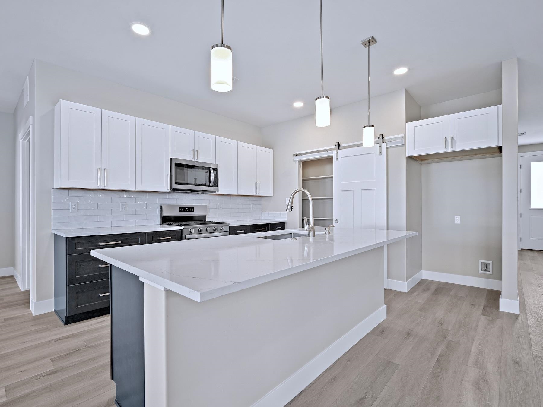 2952 Apollo Drive Grand Junction, CO 81504 - Photo 4 of 27 a large kitchen with cabinets