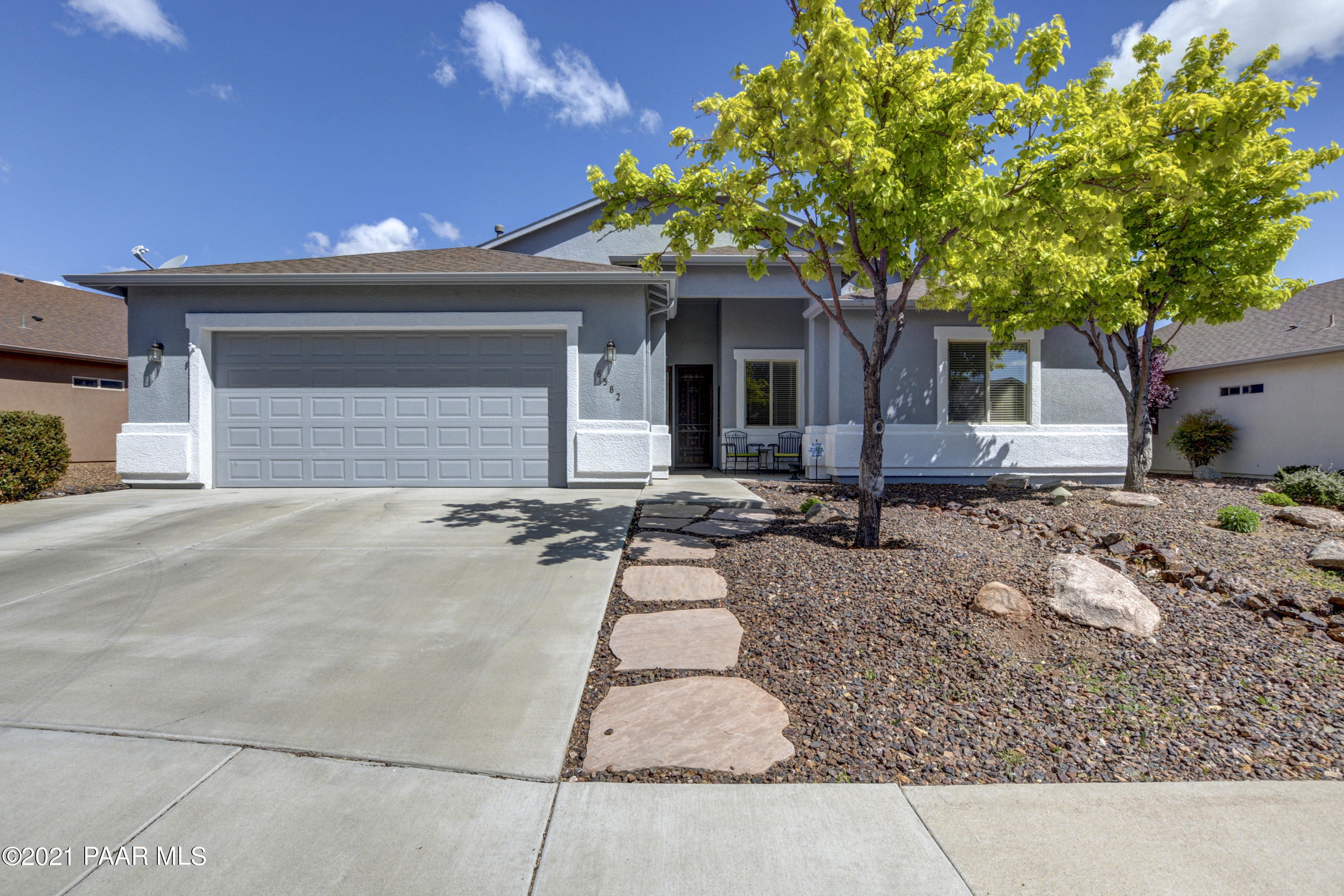 6582 Farmstead Road, Unit 3 Prescott Valley, AZ 86314 - Photo 1 of 41 a house view with a sitting space