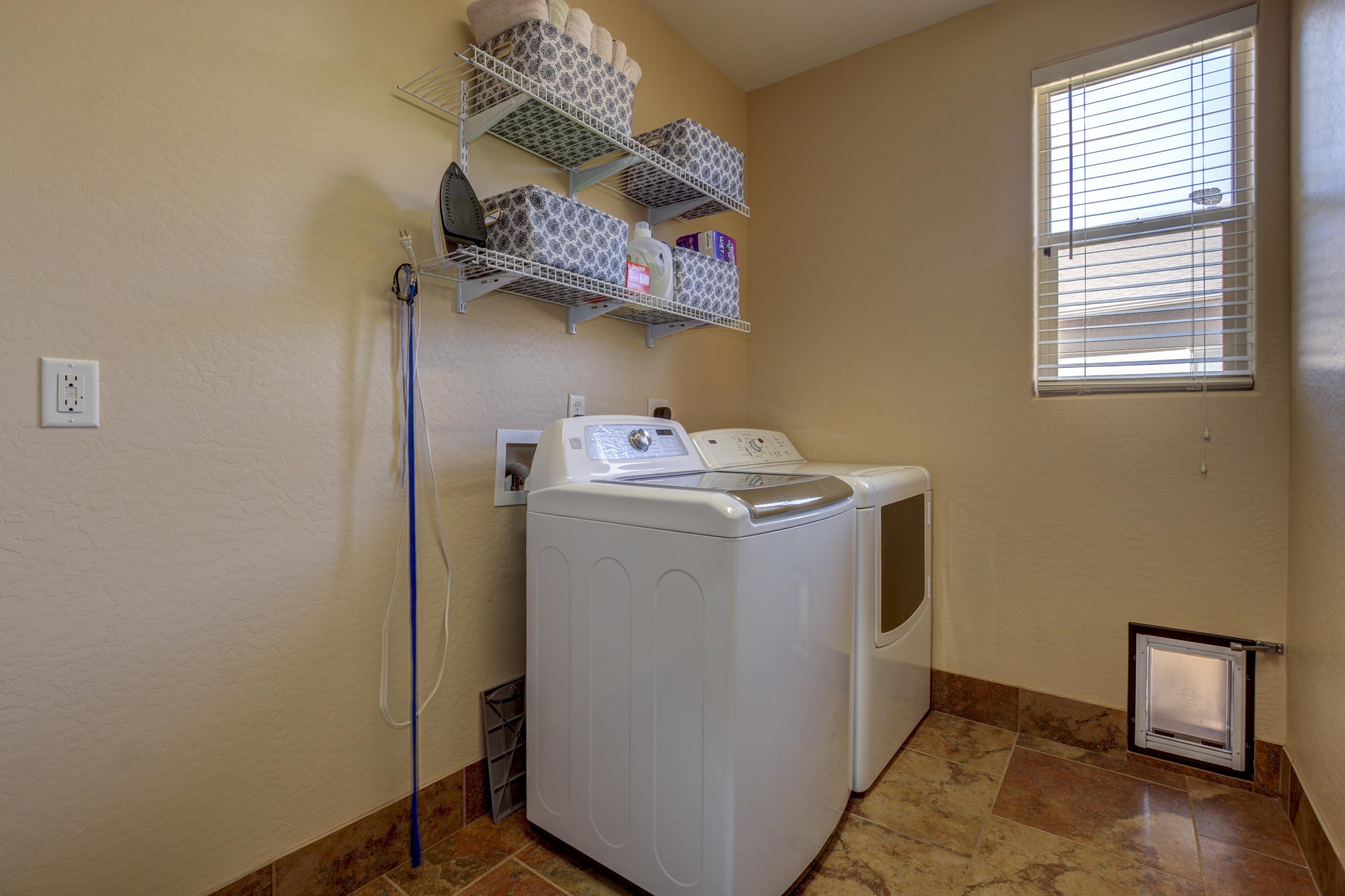 6582 Farmstead Road, Unit 3 Prescott Valley, AZ 86314 - Photo 21 of 41 a utility room with dryer and washer