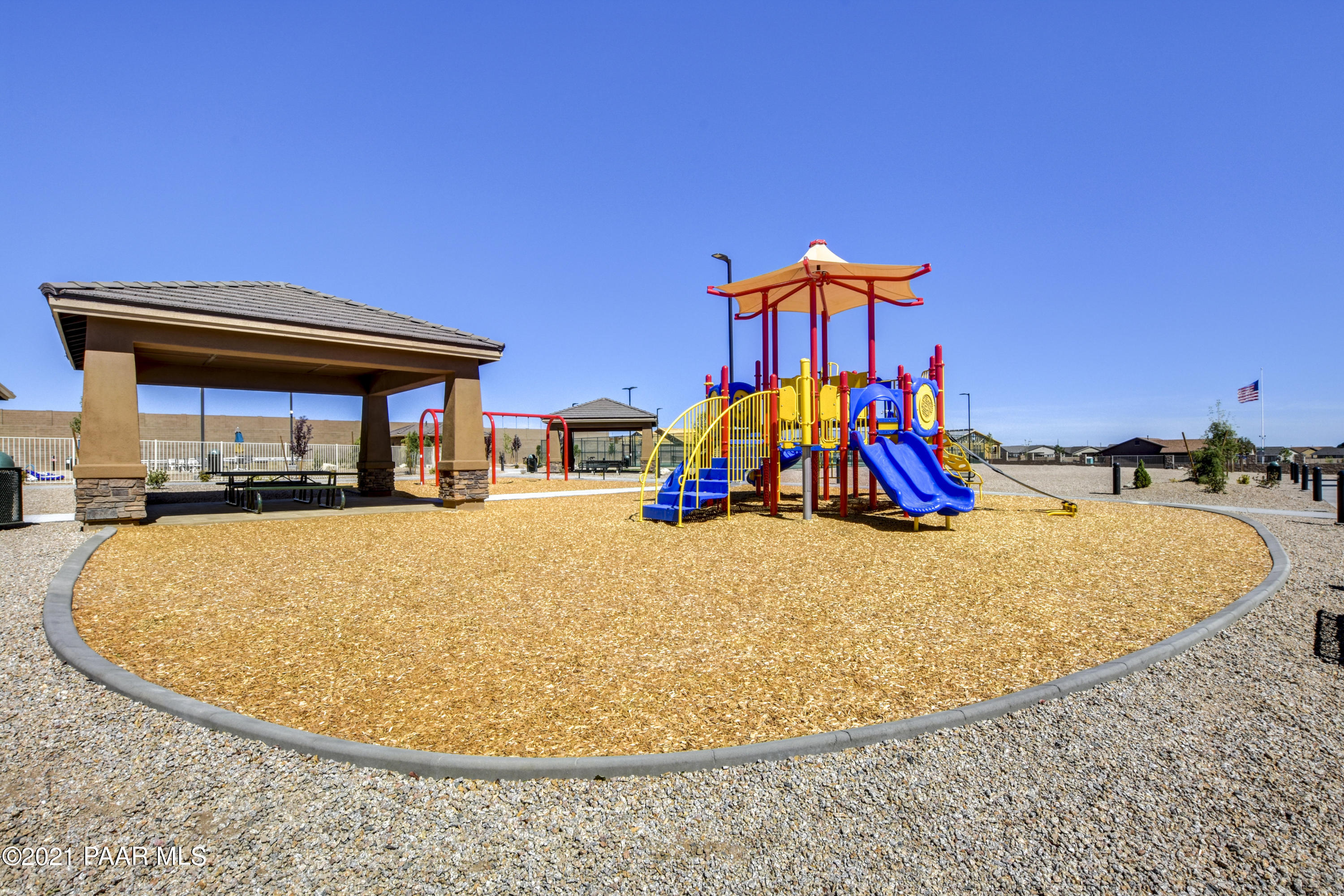 6582 Farmstead Road, Unit 3 Prescott Valley, AZ 86314 - Photo 37 of 41 a view of a swimming pool with an outdoor seating