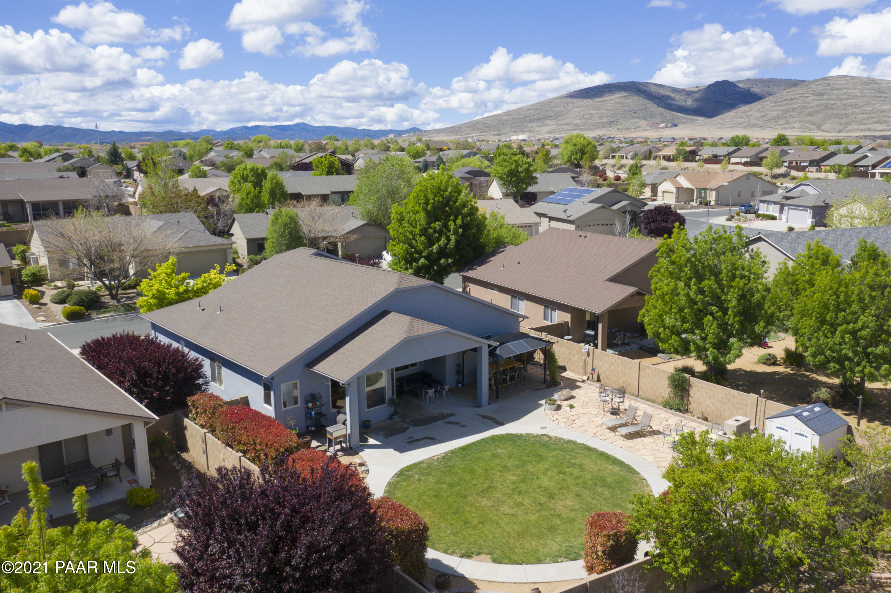 6582 Farmstead Road, Unit 3 Prescott Valley, AZ 86314 - Photo 4 of 41 an aerial view of a house with a garden