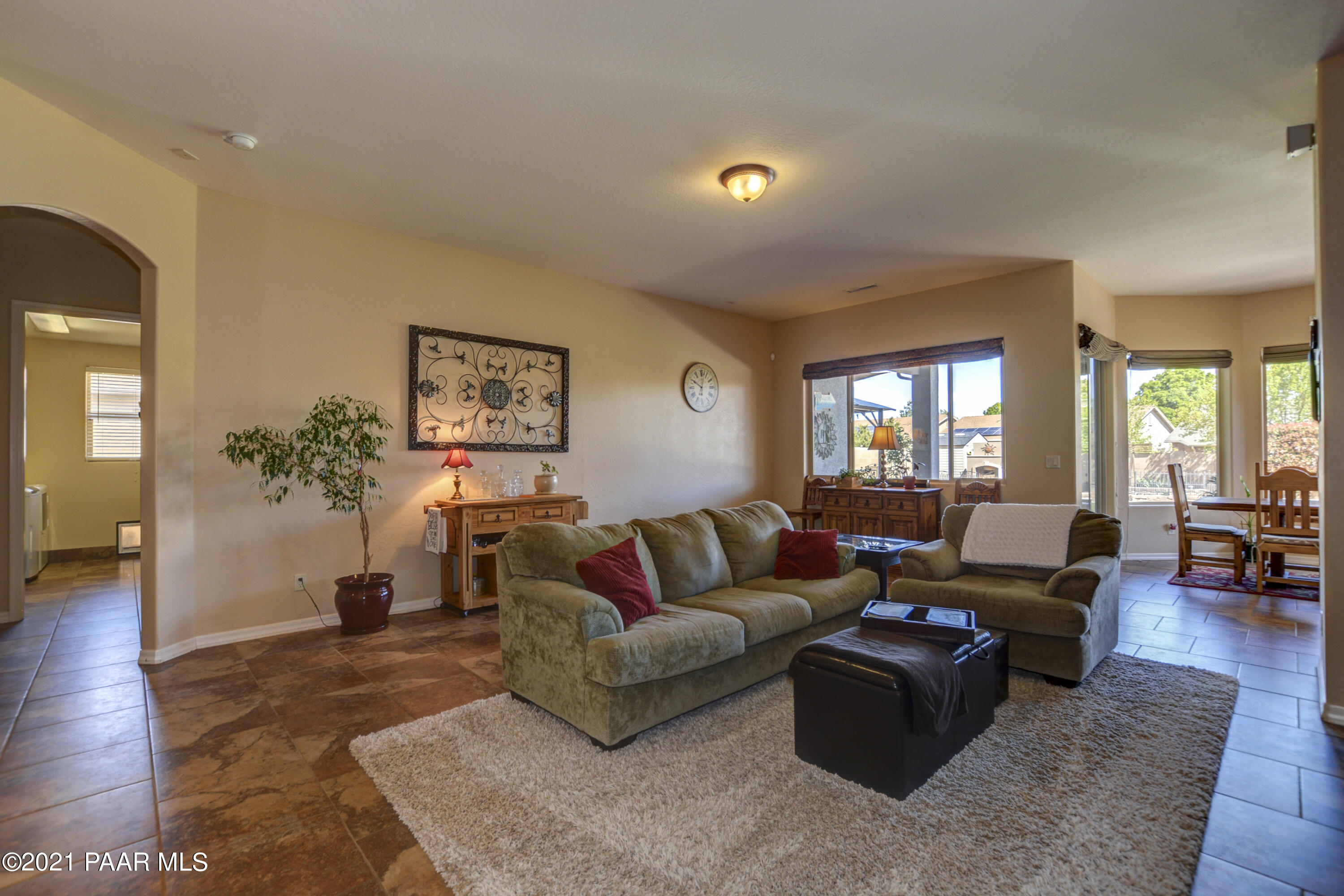 6582 Farmstead Road, Unit 3 Prescott Valley, AZ 86314 - Photo 7 of 41 a living room with furniture and wooden floor