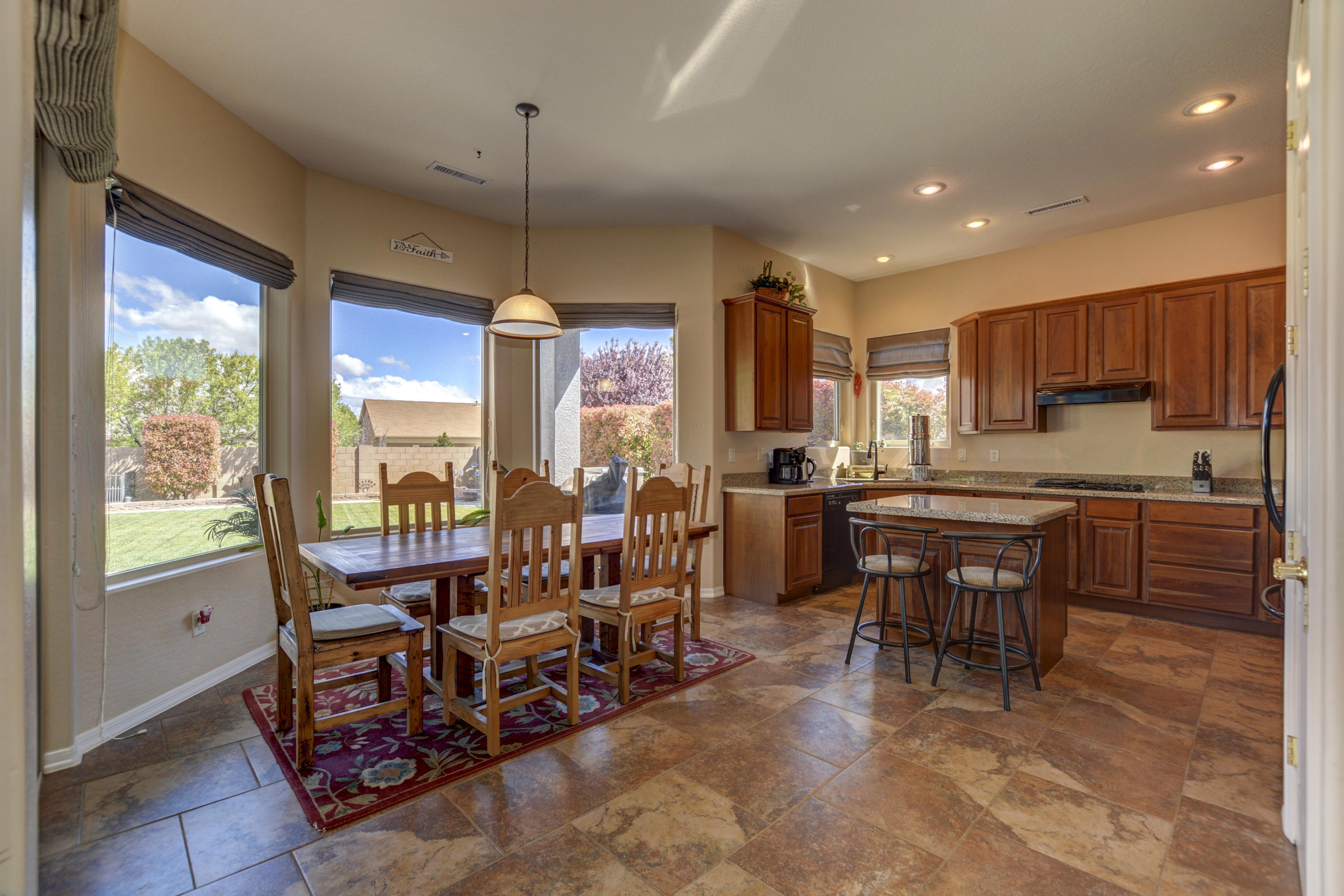 6582 Farmstead Road, Unit 3 Prescott Valley, AZ 86314 - Photo 9 of 41 a view of a dining room with furniture window and outside view