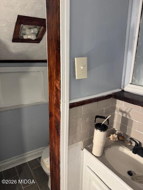 2175 Winship Street Macon, GA 31204 - Photo 12 of 15 a bathroom with a sink and a mirror