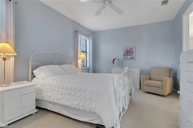 a bed room with a bed and a couch