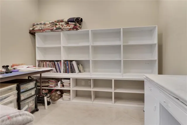 a view of a workspace with a shelf