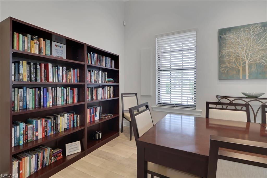 26233 Palace Lane, Unit 201 Bonita Springs, FL 34135 - Photo 37 of 46 a view of a workspace with furniture window and cabinet