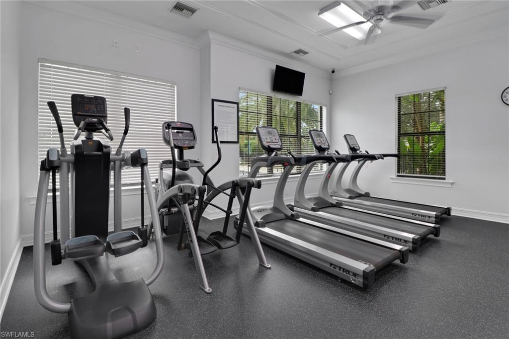 26233 Palace Lane, Unit 201 Bonita Springs, FL 34135 - Photo 40 of 46 a view of a room with gym equipment
