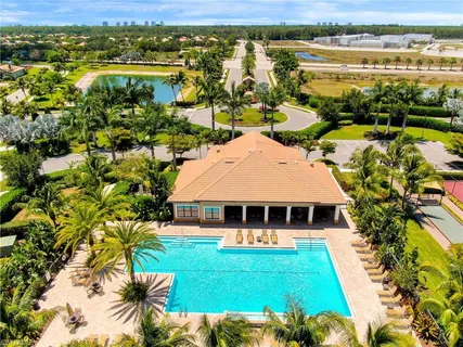 a view of a swimming pool and lounge chair