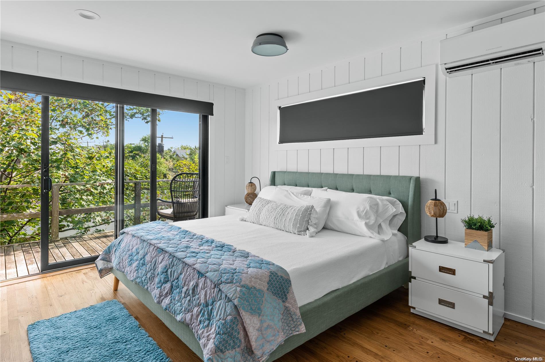 220 Cottage Walk Ocean Beach, NY 11770 - Photo 18 of 32 a bedroom with a bed and window