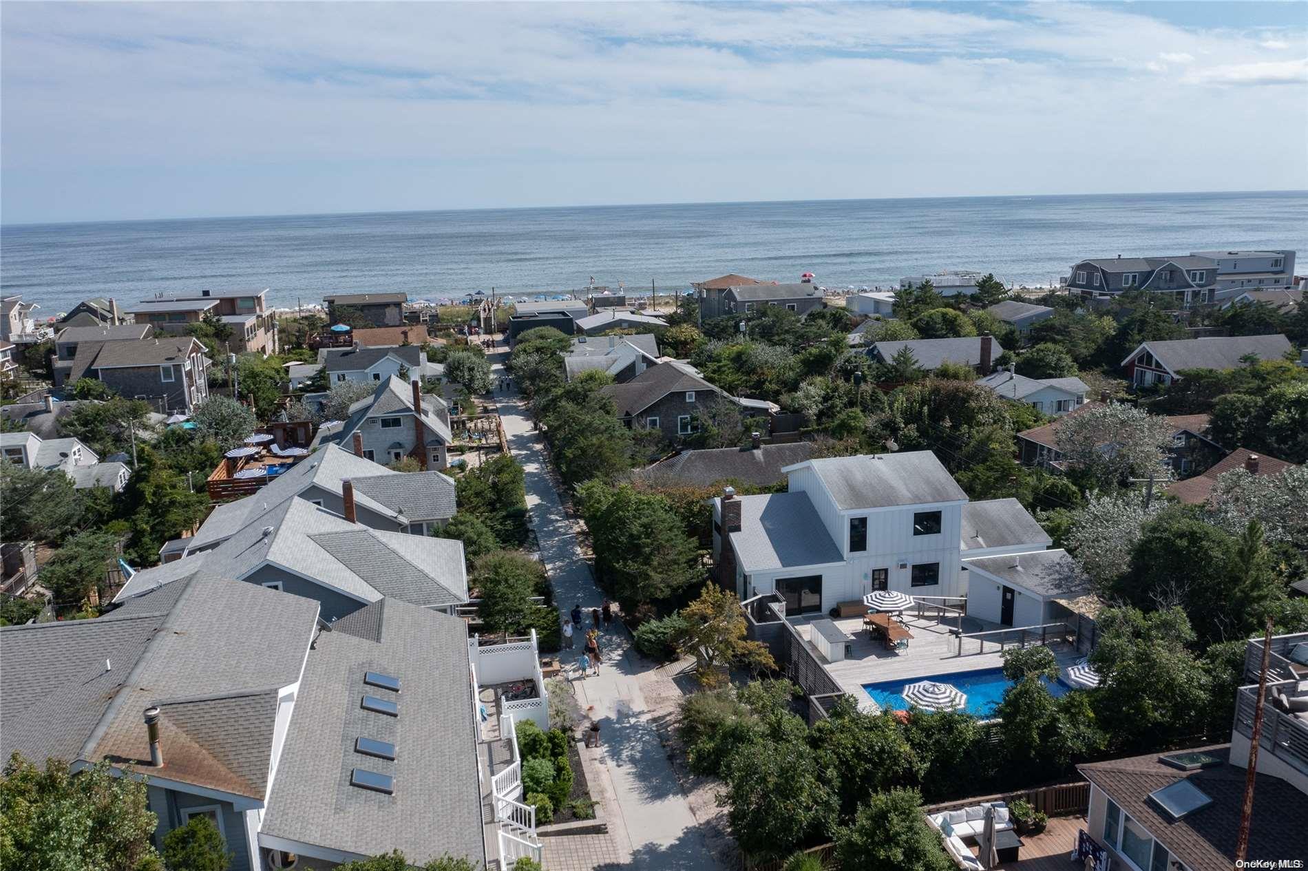 220 Cottage Walk Ocean Beach, NY 11770 - Photo 2 of 32 an aerial view of multiple house