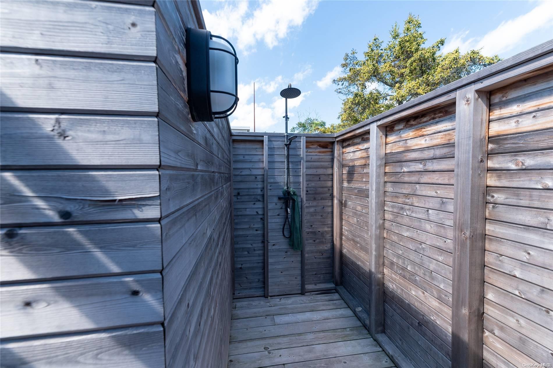 220 Cottage Walk Ocean Beach, NY 11770 - Photo 28 of 32 a bathroom with a shower