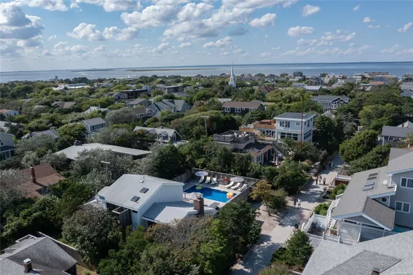 an aerial view of a city with lots of residential buildings