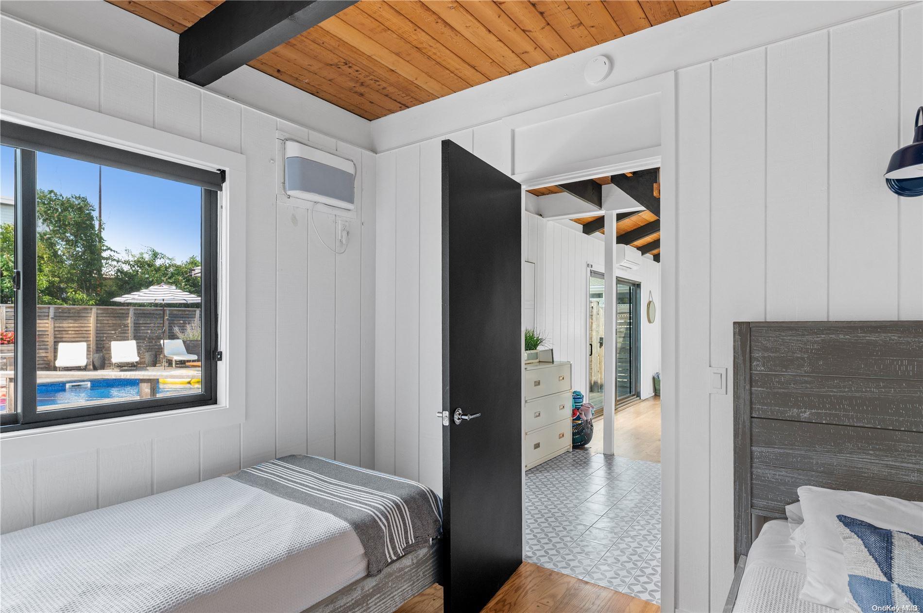 220 Cottage Walk Ocean Beach, NY 11770 - Photo 10 of 32 a en suite bathroom with a sink and a shower