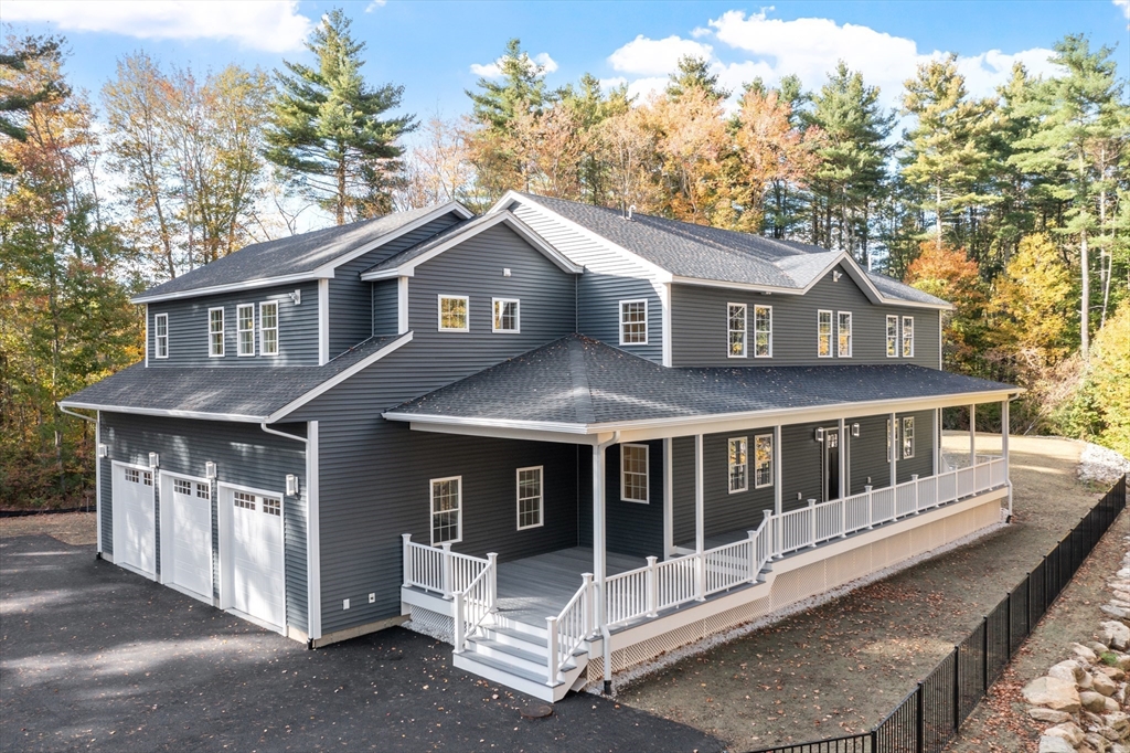 181A South Road Pepperell, MA 01463 - Photo 1 of 42 a front view of a house with a porch