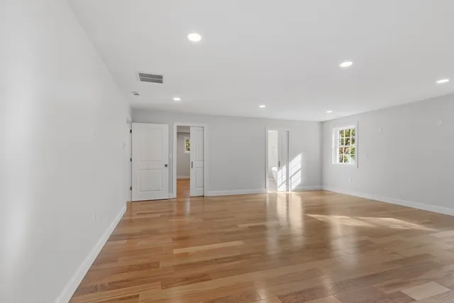 an empty room with windows