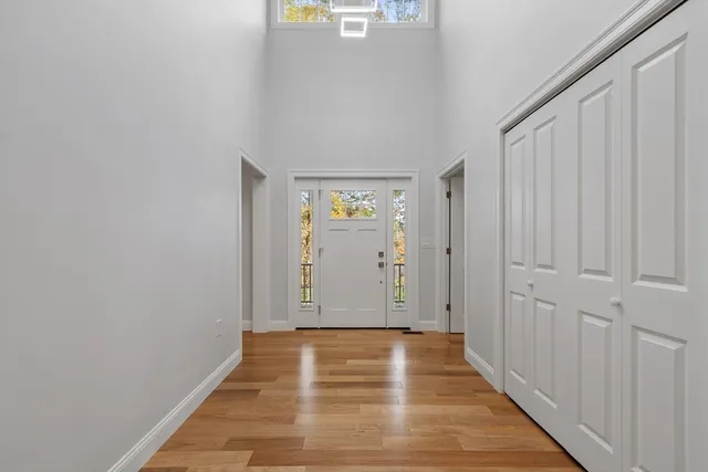 a view of room with wooden floor