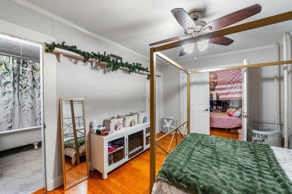 27 Appleton Street Salem, MA 01970 - Photo 11 of 31 a bedroom with furniture and a large mirror