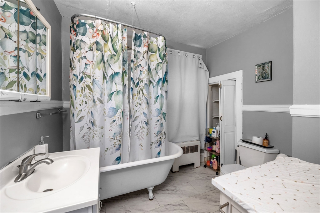 27 Appleton Street Salem, MA 01970 - Photo 10 of 31 a bathroom with a sink and a bathtub