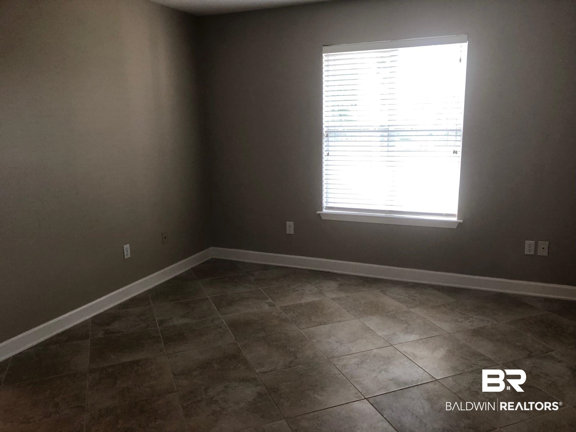 9394 Villas Drive, Unit 26B Foley, AL 36535 - Photo 11 of 14 Guest Bedroom