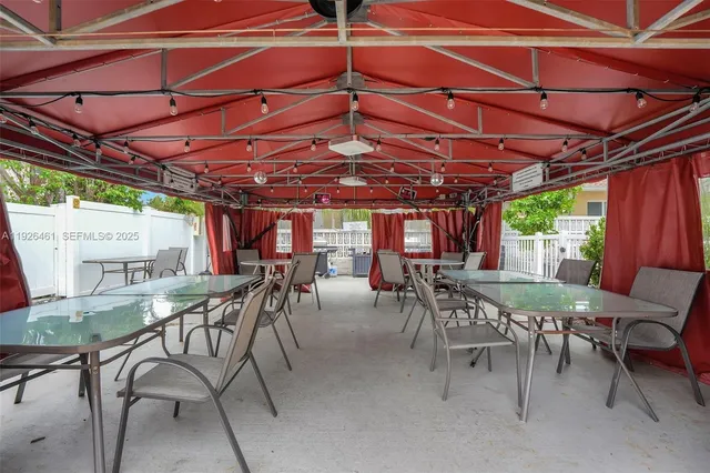 a view of a chairs and table in the terrace