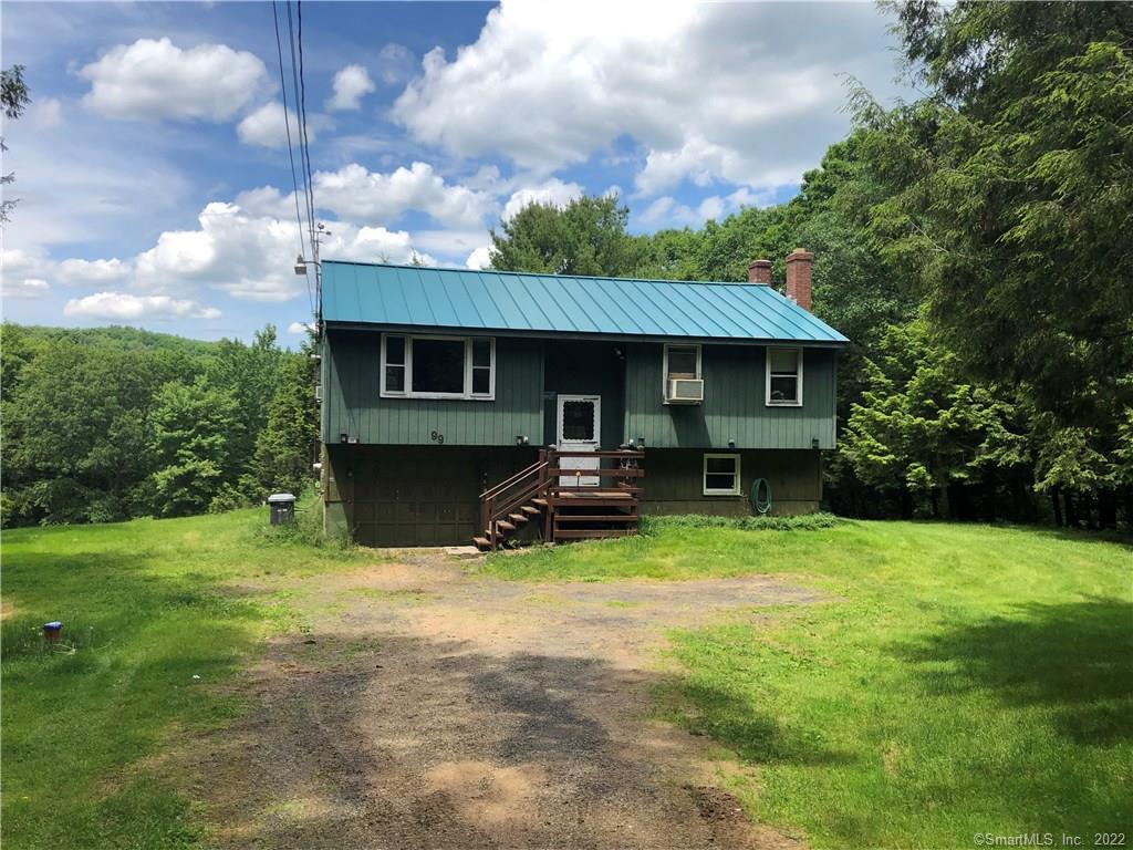 99 Nagy Road Ashford, CT 06278 - Photo 1 of 1 a view of a house with backyard and sitting area
