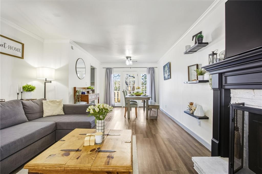 2763 Farmstead Road Smyrna, GA 30080 - Photo 11 of 35 a living room with furniture and wooden floor