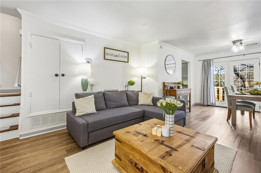 2763 Farmstead Road Smyrna, GA 30080 - Photo 12 of 35 a living room with furniture and wooden floor